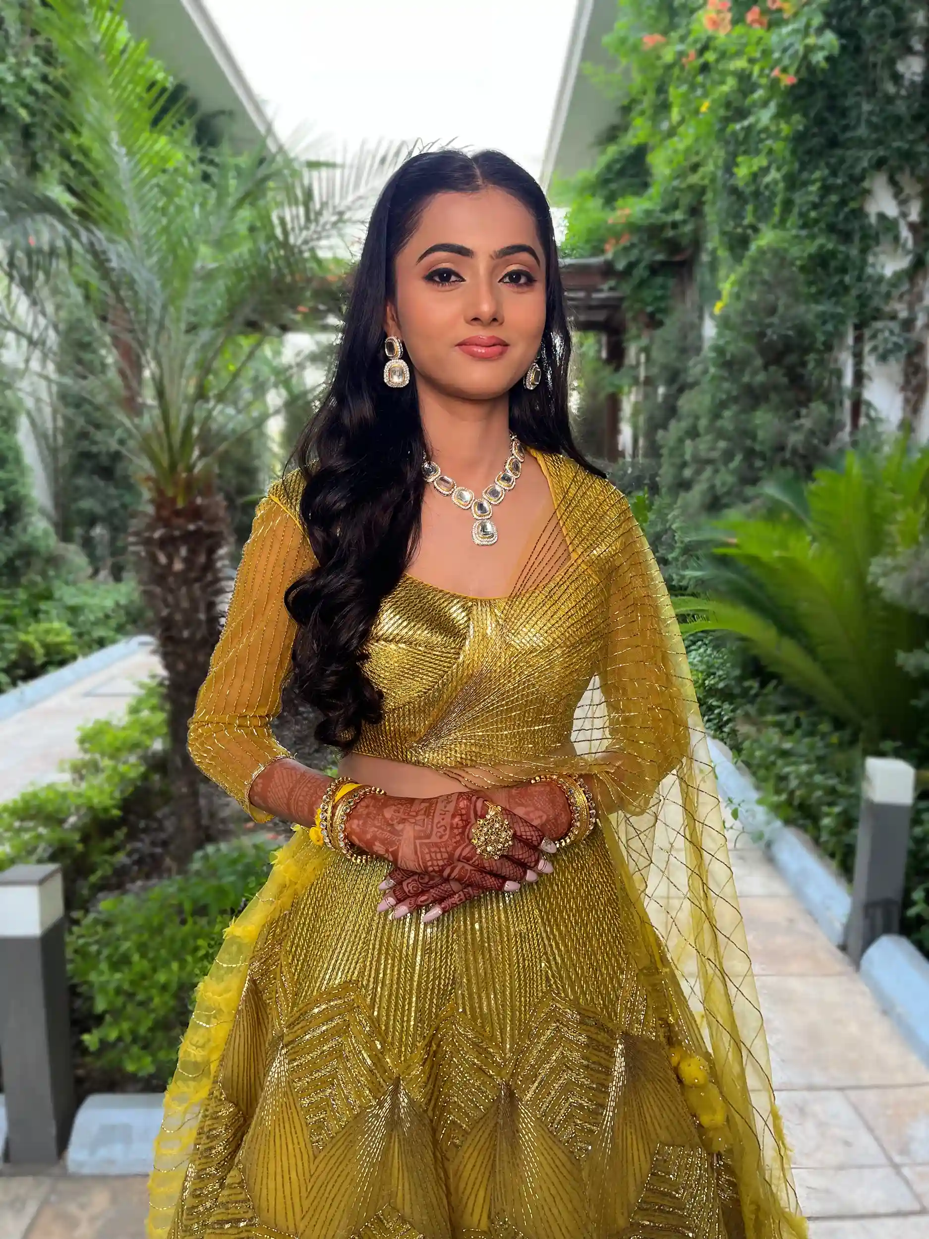 Modern bun hairstyle with floral accents